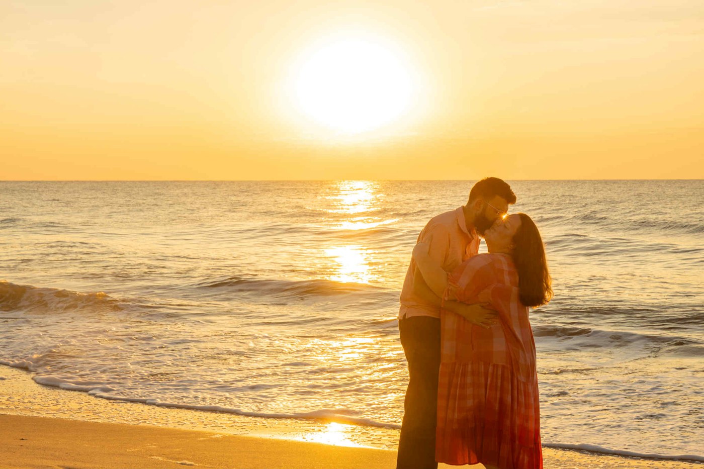 Austin and Sarah on the beach at sunset