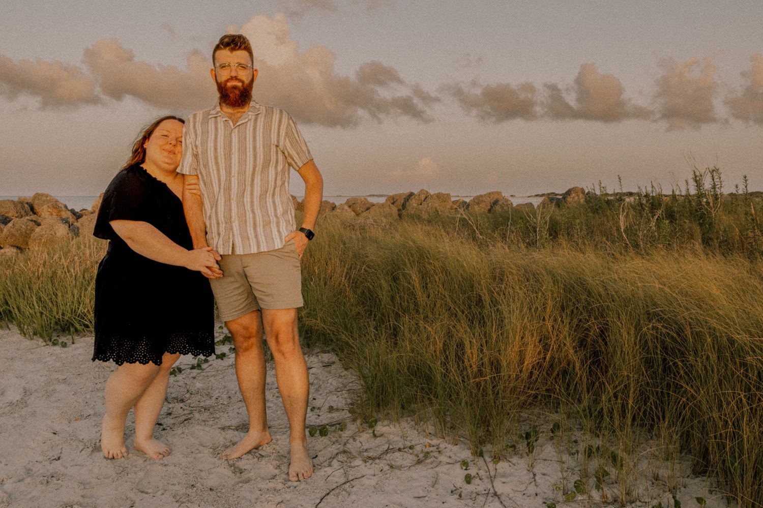 Austin and Sarah on the beach at golden hour