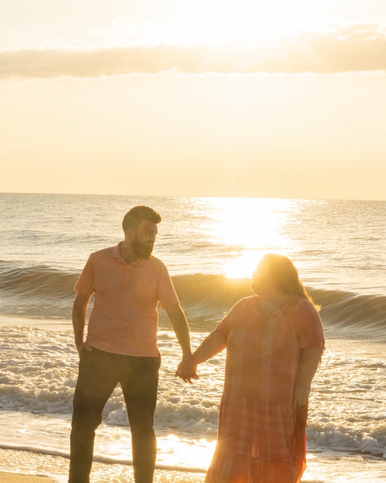 Austin and Sarah Rooper on the beach at sunset